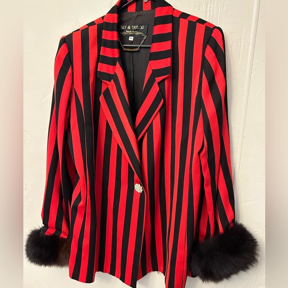 Black and white Jeweled with black fur trim on the sleeves.